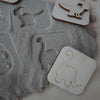Sandstempel aus Holz mit Dinos, handgefertigt