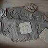 Sandstempel aus Holz mit Dinos, handgefertigt