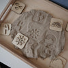 Sandstempel aus Holz mit Wettersymbolen, handgefertigt