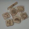 Sandstempel aus Holz mit Wettersymbolen, handgefertigt